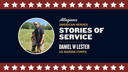 Daniel W Lester, US Marine Corps veteran, standing on a sunny field hugging a young boy, showcasing their bond
