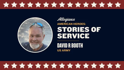 David R Booth, US Army, smiling outdoors wearing sunglasses on his head