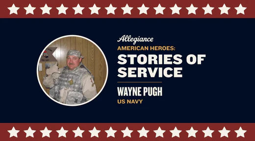Wayne Pugh, US Navy veteran, in military uniform with a backdrop of wood paneling & a sign that reads "Operation Noble Eagle"