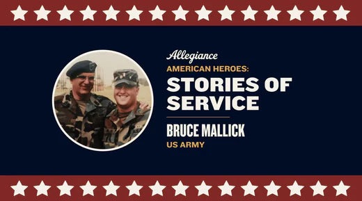 Bruce Mallick, US Army, smiling in uniform alongside another soldier, both wearing camouflage & berets